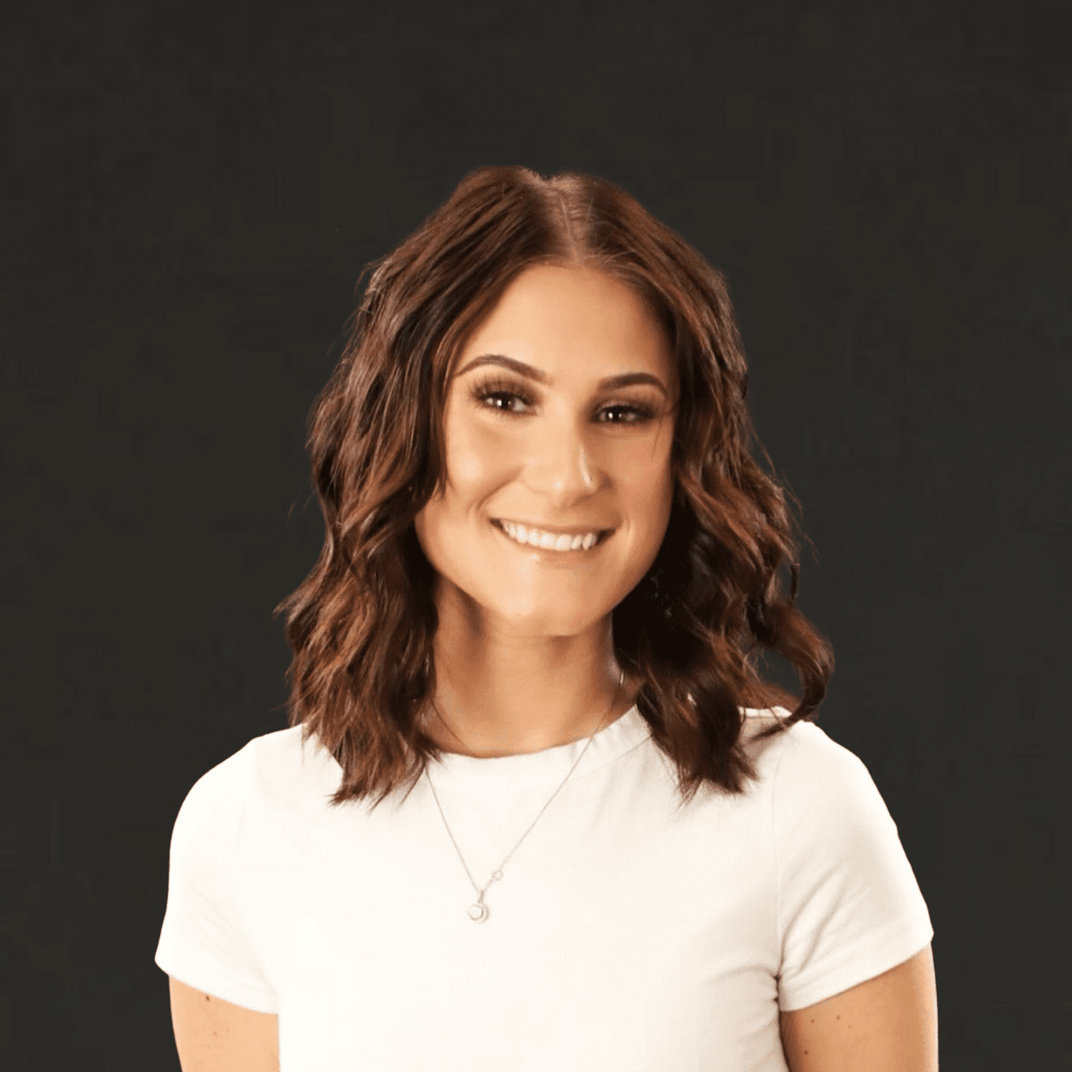 Portrait of Olivia, a professional stylist at Spa 309 Salon & Boutique, showcasing their expertise and style.