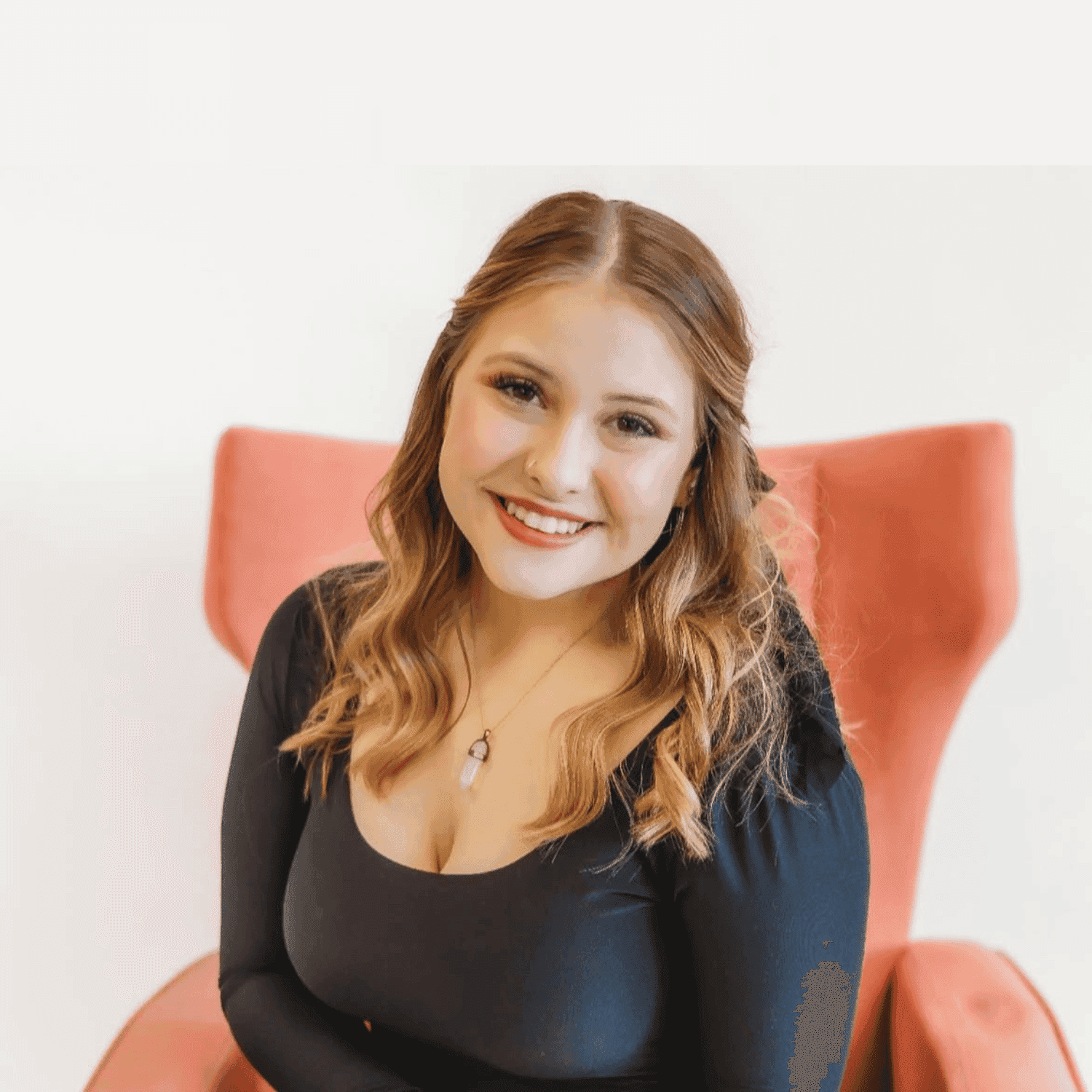 Portrait of Briana, a professional stylist at Spa 309 Salon & Boutique, showcasing their expertise and style.