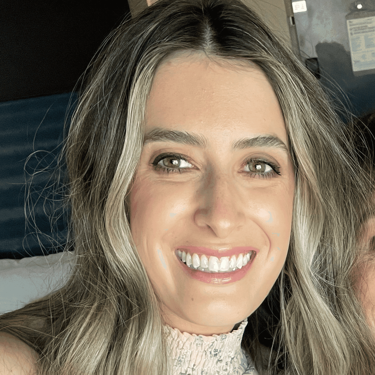 Portrait of Ally, a professional stylist at Spa 309 Salon & Boutique, showcasing their expertise and style.