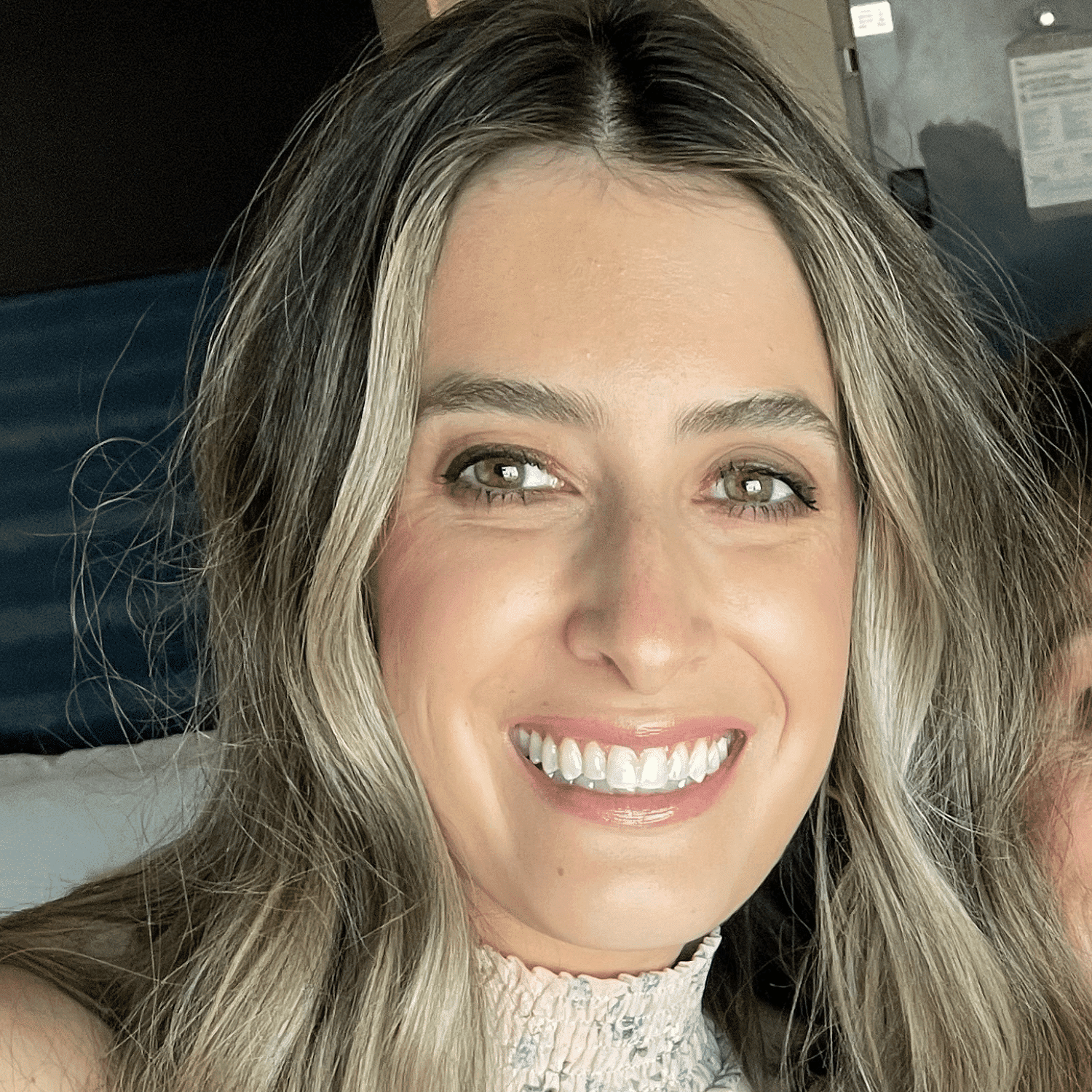 Portrait of Ally, a professional stylist at Spa 309 Salon & Boutique, showcasing their expertise and style.