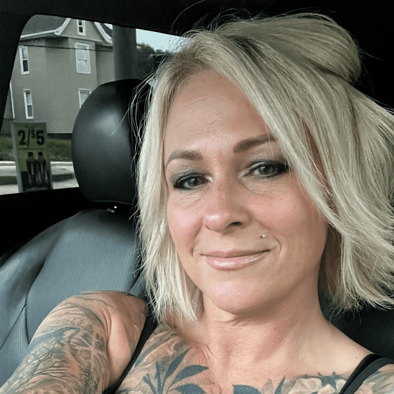 Portrait of Tricia, a professional stylist at Spa 309 Salon & Boutique, showcasing their expertise and style.