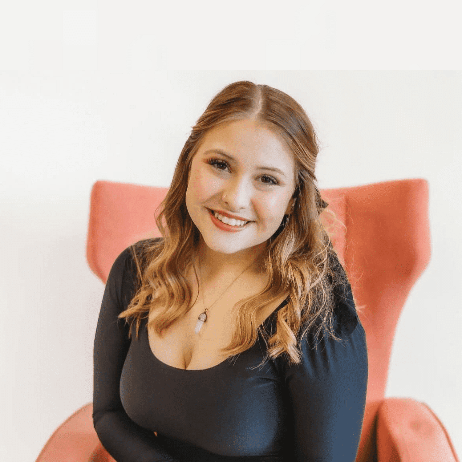 Portrait of Briana, a professional stylist at Spa 309 Salon & Boutique, showcasing their expertise and style.